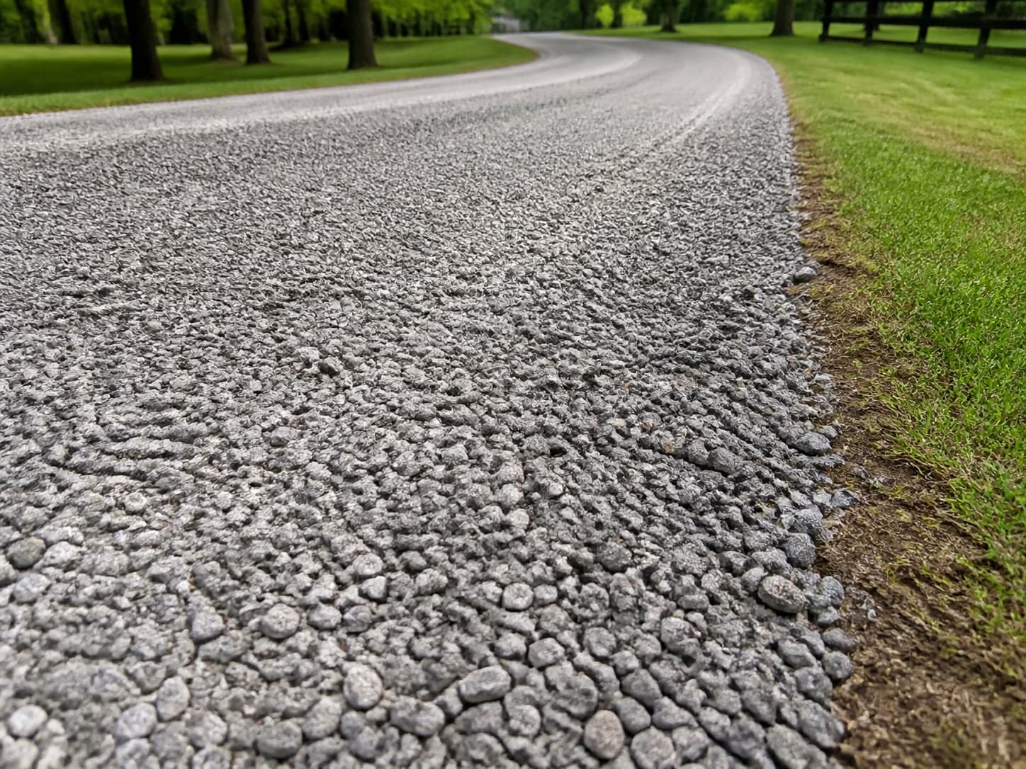 Ruts from vehicles or runoff on a gravel driveway