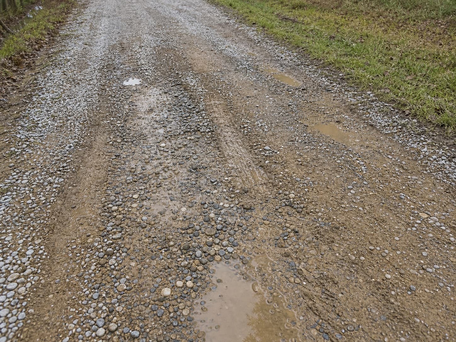 Muddy or thin gravel areas on a gravel driveway
